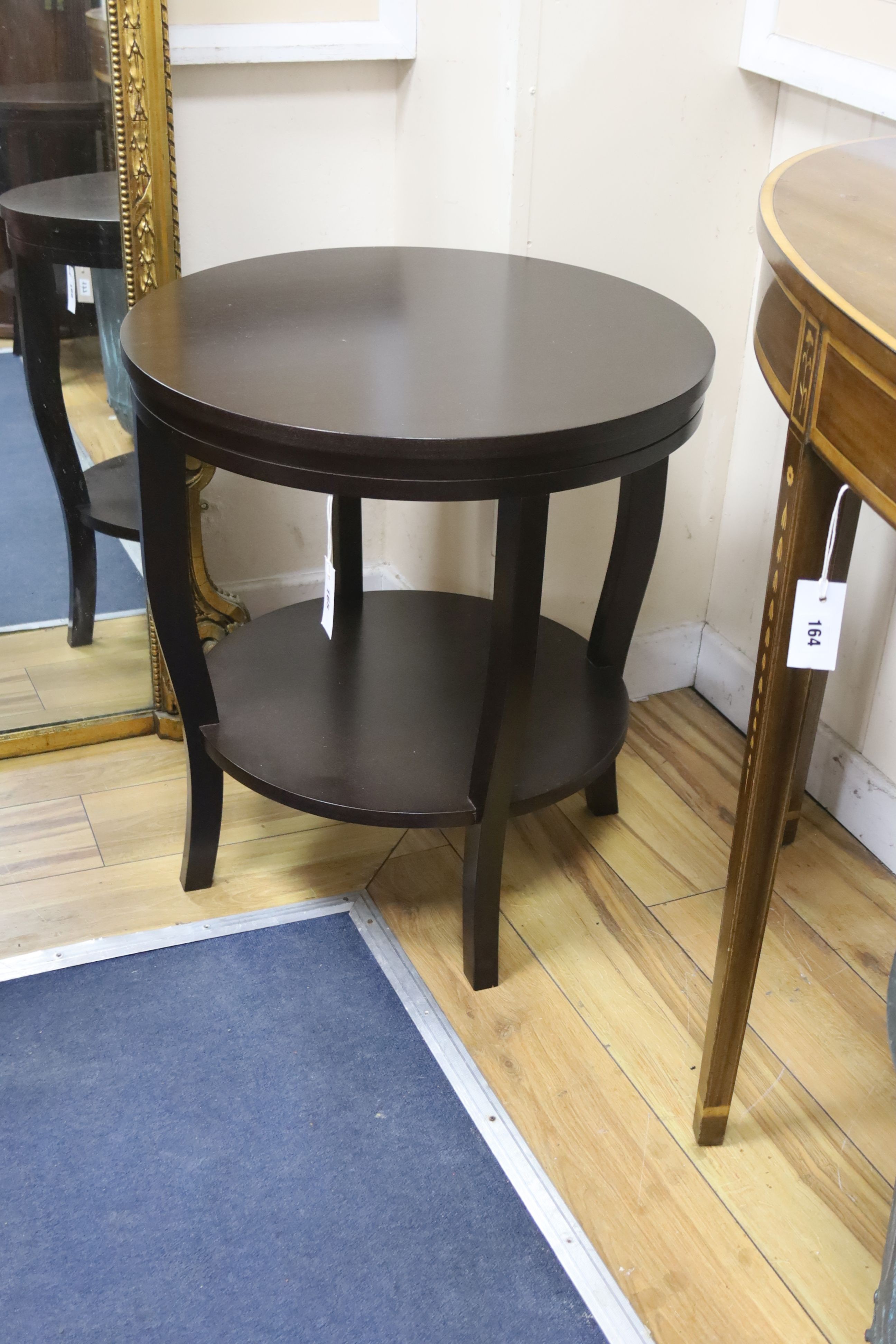 A pair of contemporary circular two tier occasional tables, diameter 60cm, height 65cm